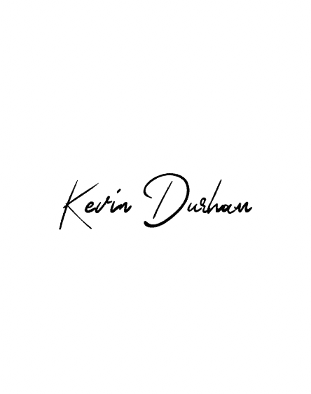 Handwritten text 'Kevin Durham' on a textured, blue background with small white dots.