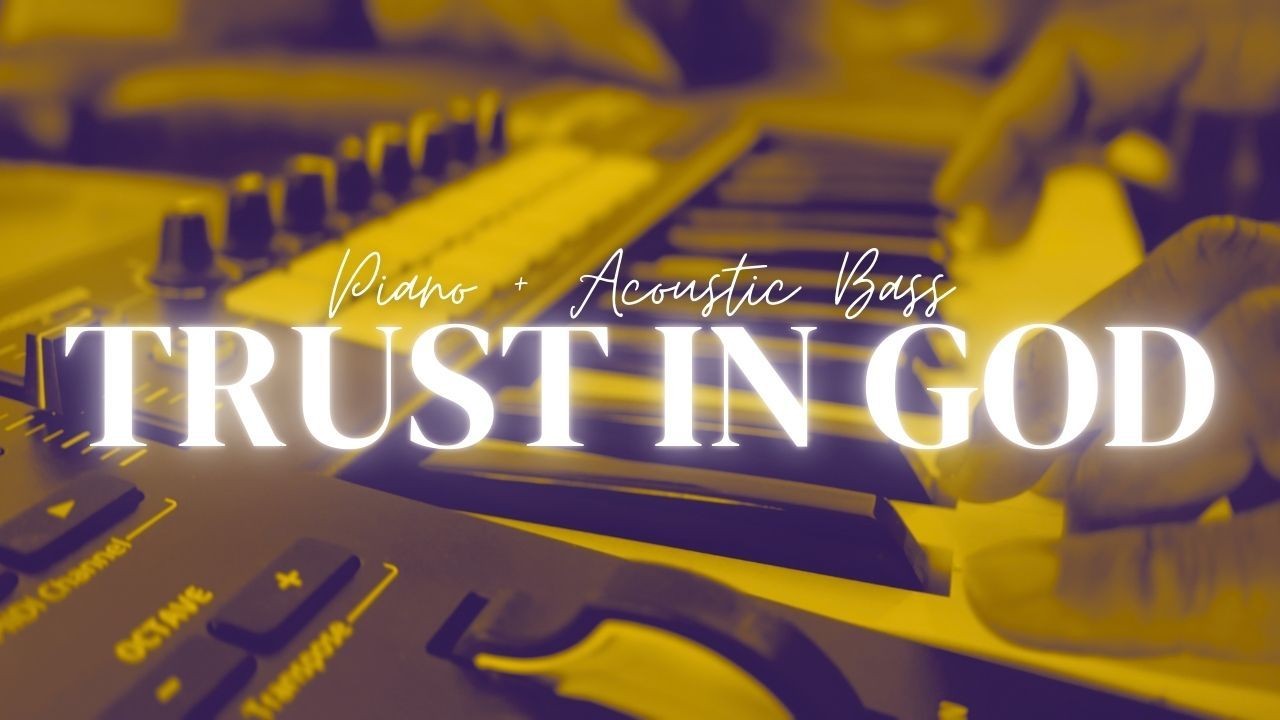 Hands playing piano keys with text 'Trust in God' overlaid on the image.